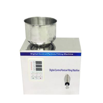 China Automatic Valve Dry Bag Food Extinguisher Powder Bottle Slot Packing Machine/Particle Filling Machine for sale