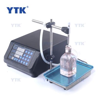 China YTK Small Semi-automatic Food Milk Beverage Bottle Drinks Filler Flavor Liquid Filling And Weighing Machine for sale