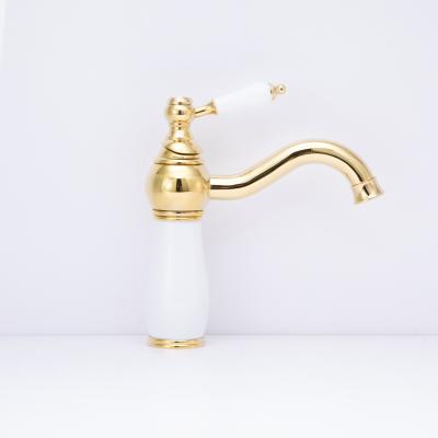 China Modern Unique K Color Bathroom Gold Factory Porcelain Ceramic Sink Faucet 1552 for sale