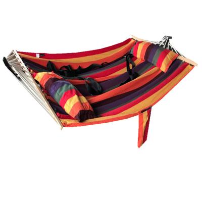 China Super comfortable cotton canvas hammock with wooden stick bar and pillows, use for outdoor leisure. for sale