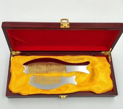 China Custom Gift High Quality Anti-Static Set Color Fish Shape Anti-Static Titanium Metal Stainless Steel Hair Comb With Logo For Hair Care for sale