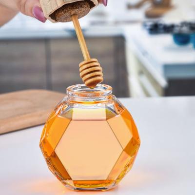 China Wholesale 100ml/220ml/380ml Freshness Preservation Hexagonal Honey Jar Glass Food Can Olive Wood With Wooden Lid And Dipper for sale