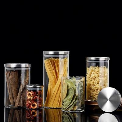 China Wholesale Viable High Borosilicate Airtight Storage Glass Jar With Metal Lid Kitchen Dried Fruit Cereal Storage Glass Jars for sale