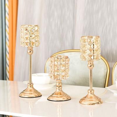 China Centerpieces Large Crystal Candle Holders Home Decorative Pillar Gold Wedding Table Centerpieces for sale