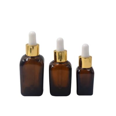 China Various 10ml 15ml 20ml 30ml 50ml 100ml Amber Square Glass Cosmetic Dropper Widely Used Cosmetic Essential Oil Bottle for sale