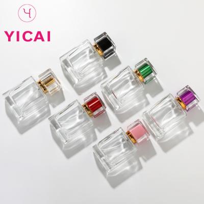 China Personal Care Refillable Clear Square 30ml 50ml Spray Glass Perfume Bottle for sale