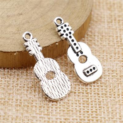 China 100pcs/bag 26x11mm Vintage Antique Silver Plated Bronze Plated Zinc Alloy Guitar Charms Pendants ABD-C10474 for sale