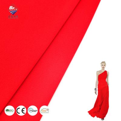 China New arrival fashion red color 100%polyester 160gsm soft knitted stretch fabric for dress for sale