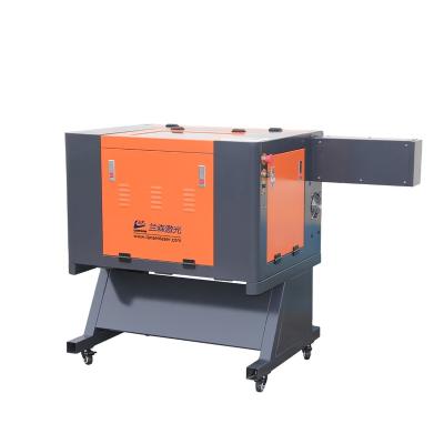 China Small Water Cooled Mini Laser Engraver Nonmetal Cloth Plywood MDF Laser Cutter Engraver for sale