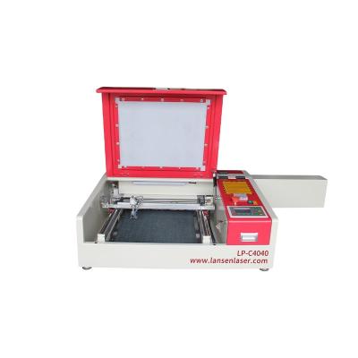 China Mini 4040 Desktop CO2 Laser Water Cooled Wood Plastic Acrylic Engraving Machine for sale