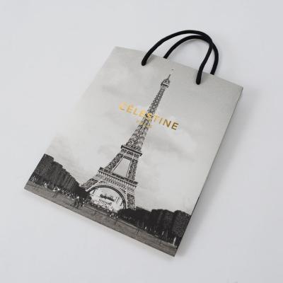 China Recyclable Customized Elegant Boutique Shopping Paper Bag Shopping Bag Gift Bag With Ribbon Handles for sale