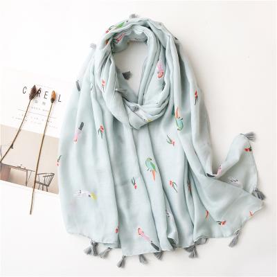 China Newest Malaysia 2021 wholesale accessories wearing cotton and hijabs soft top quality canvas women shawls printed scarf with simple birds pattern scarves for sale