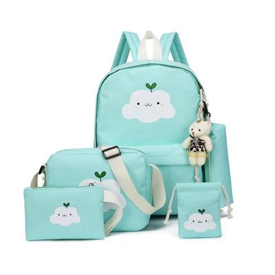 China Four-piece Cute Children's Style Pattern New Fashion Waterproof Canvas Cartoon School Bag for sale