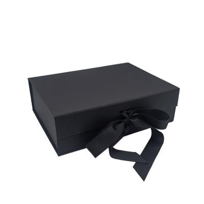 China Recyclable Custom Logo Printed Matte Ribbon Black Folding Gift Packaging Paper Box For Christmas for sale