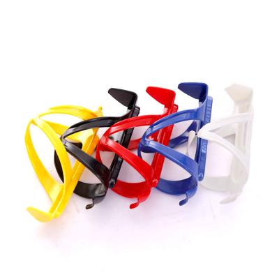 China Cycle accessories bicycle yellow/blue universal bike bottle holder adjustable kettle rack for sale