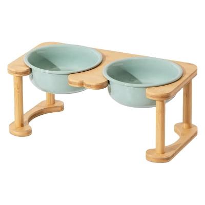 China Sustainable Solid High Wooden Cat Rack Bowl Natural Bamboo Pet Feeder With Ceramic Bowls for sale