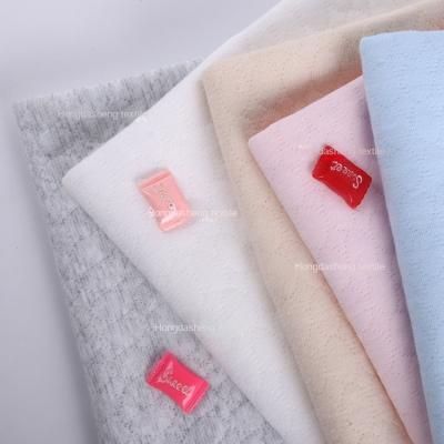 China Soil Autumn And Winter Warm Baby Midlayer Repellent Hot Selling Cotton Fabric A Class Baby Cloth Clothes Romper Crawling Fabric for sale