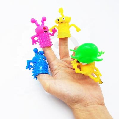 China New style TPR soft finger puppet toys for capsule/education toys/bulk material monster hand plastic finger puppet for sale