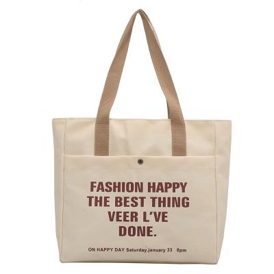 China Multiple Uses Wholesale Canvas Lady Bags Stain Canvas Bag Handheld Tote Bag For Shopping And Commuting for sale