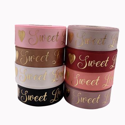 China Hot Stamping 1 Inch Rose Floral Polyester Wholesale Polyester Gold Foil Love Valentines Gift Sweet Ribbon for sale