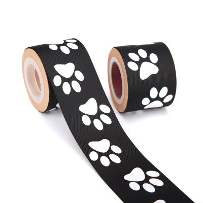 China Hot Selling High Tenacity 2 Inch Dogs Print Paws GroGrain Tape Printing Ribbon 50mm Polyester Animal Black Grosgrain Paw Print Ribbon for sale