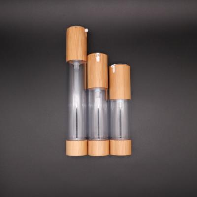 China Personal Care Luxury Empty Bamboo Airless Serum Bottle 22mm Diameter for sale