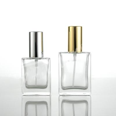 China Rectangular Spray Cap 30ml 50ml 100ml Clear Perfume Glass Spray Bottle for sale