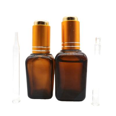 China Dropper Sale Square 10ml 30ml 50ml Amber Glass Dropper Bottle With Pump Dropper Cap for sale