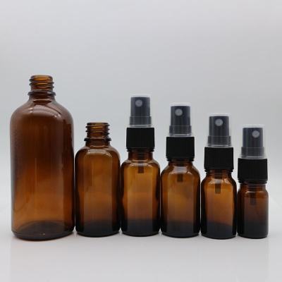 China Spray 50ml 100ml Amber Glass Perfume Spray Bottle With Plastic Spray Mist Cap for sale