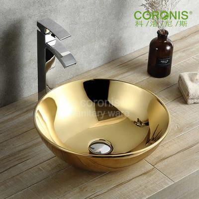 China Matte Polished Round Shape Bathroom Ceramic Gold Color Art Wash Basin for sale