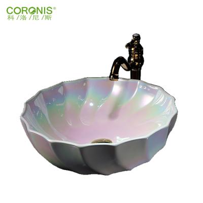 China Durable Decorative Crystal White Shell Shape Bathroom Ceramic Shampoo Sink for sale