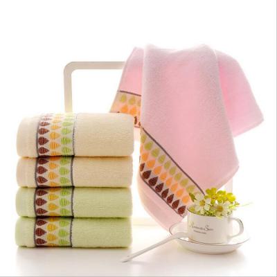 China Custom Stock QUICK DRY Yarn Dye Cotton Hand Towel For Kids for sale