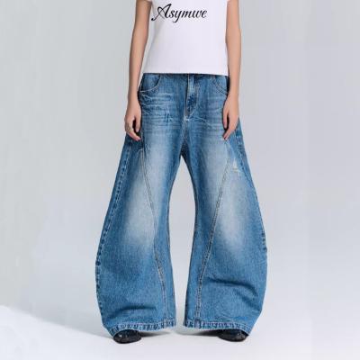 China Jeans de pantalones de denim de tejido deconstruido para hombres y mujeres en ropa callejera de talla grande en venta