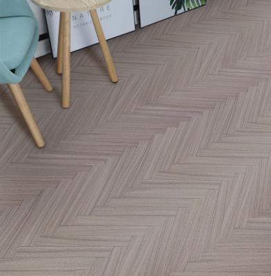 China Modern UV Lacquered A Grade 18x64x450mm Solid Okan Herringbone Hardwood Flooring for sale