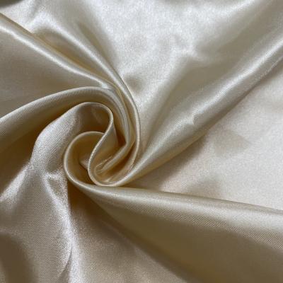 China 50D Waterproof Customized Bright Satin TPM Twist BR Print Fabric For Dress And Skirt for sale