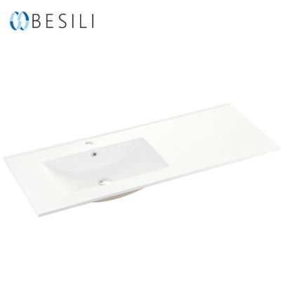 China Besili Hand Porcelain Easy Clean Sink Bowl Ceramic Wash Basin For Cabinet L120D for sale