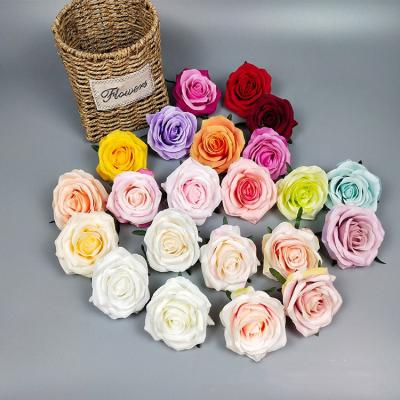 China Artificial Silk Fabric 9cm Diameter Angle Rose Head For Wedding And Party Decorations for sale