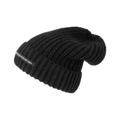 China Autumn and winter letter cloth label COMMON wool hat thickened ear protection warm knitted hat for women for sale