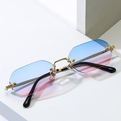 China New retro tide frame fashion sunglasses small ocean metal sunglasses Frameless piece polygonal punk personality for sale