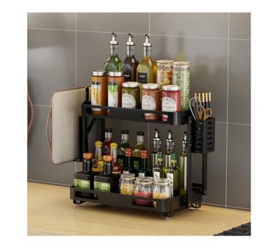 China Sustainable 2 Tier Wall Pull Out Round Bottle Spice Rack Hanging Corner Organizer Holder for sale