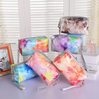 China Fashion Women Cosmetics Bag Creative Tie Dye Cute Star Sequin Gradient Clutch Bag Girl Waterproof Storage Bag for sale