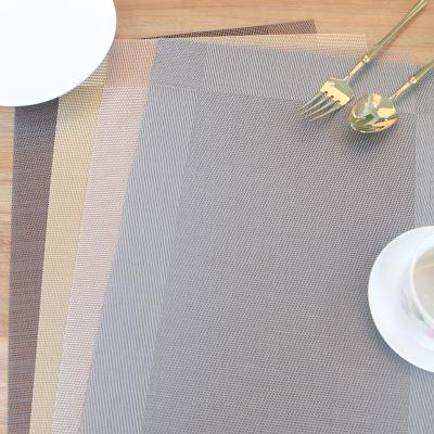 China Nordic Luxury Heat Resistant Washable Durable Rugs Woven Place Mats Customized Elegant Viable Placemat PVC Table Vinyl for sale