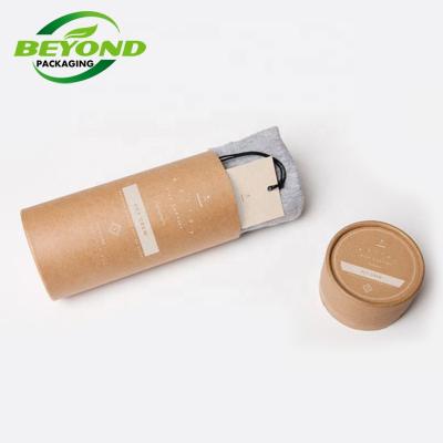 China Recyclable Custom Logo Biodegradable Cardboard Cylinder Package Container Kraft Paper Tube For Clothing T-shirt Packaging for sale