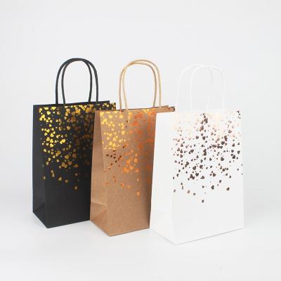 China Recycled Materials Spots Love Paper Bag Kraft Paper Bag Recyclable Portable Tanning Paper Rope Gift Bag for sale