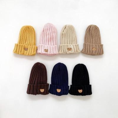 China Autumn Winter Children Solid Color Knitted Hats for Kids Girls Boys 10x9.5cm Beanies for sale