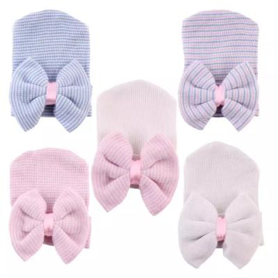 China 2022 Knitted Wool Baby Hat with Big Bow in Customized Color and Pattern Knitted for sale