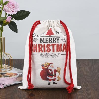 China Customized Logo 2022 Christmas Drawstring Sacks 100% Cotton Santa Stockings Candy Nuts Gift Package Bag for sale