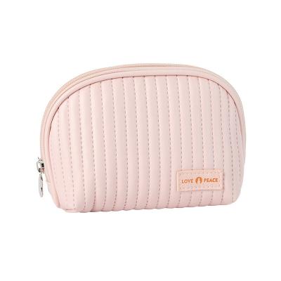 China Leather Logo Cosmetic Bags Cake Style Make Up Organizer Pouches for Cosmetics Convenience for sale