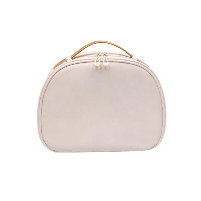 Chine Maquillage cosmétique couleur solide imperméable PU sac cosmétique pour les voyages et les articles de toilette à vendre