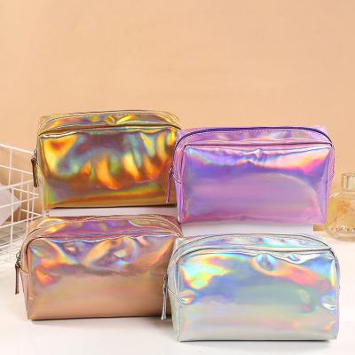 China Custom PU Leather Laser Bag Pencil Case Waterproof Brush Pouch Makeup Bag Cosmetic Bags for sale